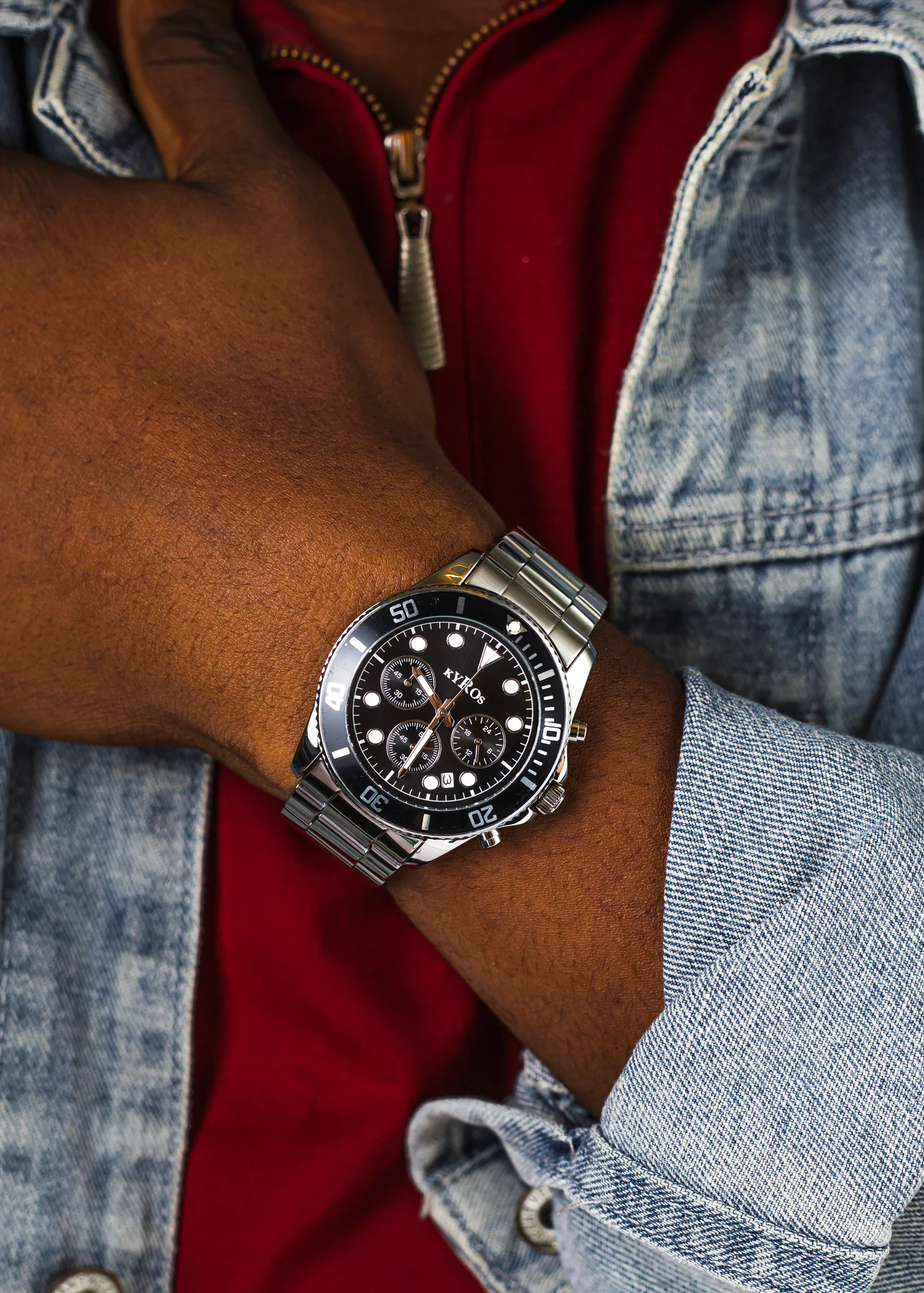 KYROS watch worn with a denim jacket